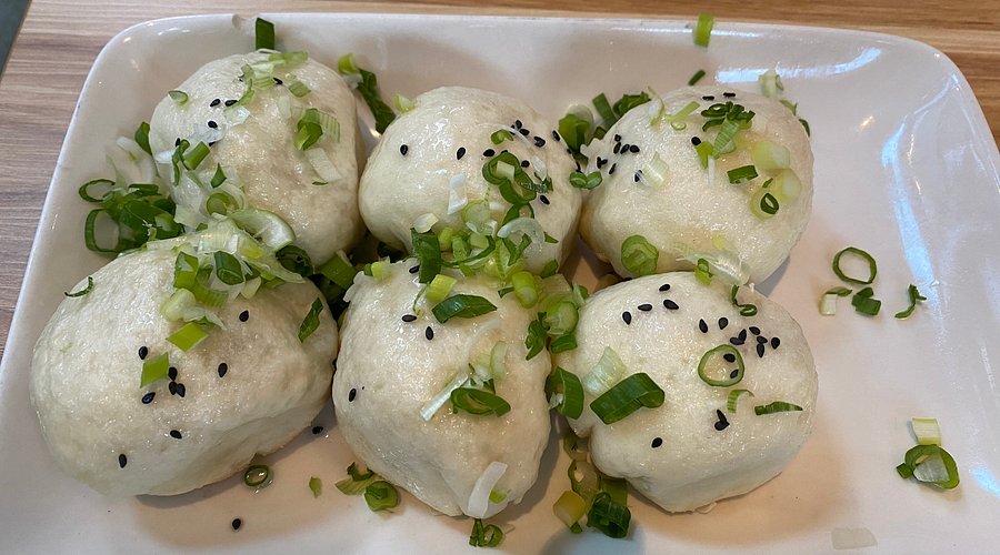 Pine and Crane DTLA signature dishes Panfried Pork Buns, Hot & Sour Soup, Beef Roll, Traditional Shaved Ice.